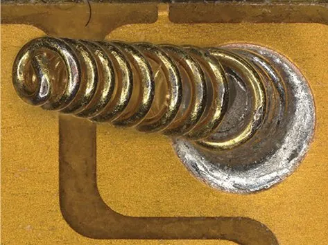 Depth-of-field fusion image of a spring on a circuit board