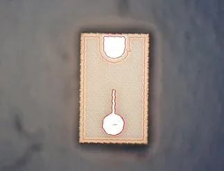 Chip pad under metallurgical microscope