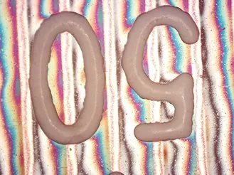 Surface marking with interference colours
